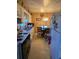 Kitchen with white cabinets and dining area at 3751 Amber Nw Rd, Atlanta, GA 30331