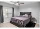 Bedroom featuring plank flooring, large window, and ceiling fan at 2700 Pine Tree Ne Rd # 2108, Atlanta, GA 30324