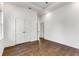Bright bedroom with gleaming hardwood floors and ample closet space at 971 Washington Sw Pl, Atlanta, GA 30314