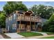 Stunning two-story home featuring double wooden balconies and eye-catching curb appeal at 971 Washington Sw Pl, Atlanta, GA 30314