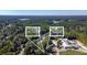 Aerial view showing two cottages near a lake at 5361 N Main St, Acworth, GA 30101