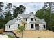 New construction home featuring modern design elements and a spacious layout in a private, wooded setting at 440 Allyson Cir, Alpharetta, GA 30009