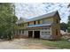 New construction home featuring a modern design and ample space in a secluded, tree-filled setting at 440 Allyson Cir, Alpharetta, GA 30009