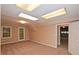 Spacious basement area with carpet flooring, natural light, and convenient access to the garage at 26 Flint Ridge Se Dr, Mableton, GA 30126