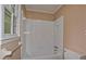 Bathroom featuring a tile-surround tub and shower combination at 26 Flint Ridge Se Dr, Mableton, GA 30126
