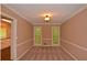 Formal dining room with natural light and carpet flooring at 26 Flint Ridge Se Dr, Mableton, GA 30126