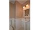 Half bathroom featuring a pedestal sink and tiled flooring at 26 Flint Ridge Se Dr, Mableton, GA 30126