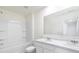 Bright bathroom boasts double vanity, shower/tub combo, and ample storage at 179 Hampton Cir, Mcdonough, GA 30253