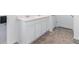 White bathroom vanity with double sinks and marble countertop at 179 Hampton Cir, Mcdonough, GA 30253