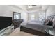 Main bedroom with a large bed and dresser at 179 Hampton Cir, Mcdonough, GA 30253