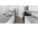 Modern kitchen with granite countertops and stainless steel appliances at 179 Hampton Cir, Mcdonough, GA 30253