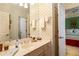 A bathroom with a large mirror and vanity space, with views to the bedroom at 3707 Peachtree Ne Rd # 1, Atlanta, GA 30319