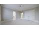 A spacious bedroom with neutral walls and a large closet with white doors at 3707 Peachtree Ne Rd # 1, Atlanta, GA 30319