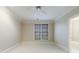 A sun-filled bedroom with a ceiling fan and bright, neutral color palette at 3707 Peachtree Ne Rd # 1, Atlanta, GA 30319