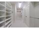 Bright walk-in closet with custom white shelving at 3707 Peachtree Ne Rd # 1, Atlanta, GA 30319