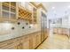 Kitchenette area showcasing custom cabinets and granite countertops at 3707 Peachtree Ne Rd # 1, Atlanta, GA 30319