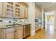 Butler's pantry featuring custom cabinets, granite counters, and stainless appliances at 3707 Peachtree Ne Rd # 1, Atlanta, GA 30319