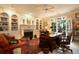 Inviting living room with built-in bookshelves and a cozy fireplace at 3707 Peachtree Ne Rd # 1, Atlanta, GA 30319