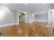 Expansive living room boasts hardwood floors, decorative trim, and arched entrances at 3707 Peachtree Ne Rd # 1, Atlanta, GA 30319