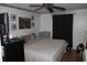 Cozy bedroom featuring hardwood floors, comfortable bed and decorative accents at 2697 Vinings Central Dr # 61, Atlanta, GA 30339