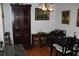 Charming dining area with wood floors, dark furniture, and antique wooden cabinet at 2697 Vinings Central Dr # 61, Atlanta, GA 30339