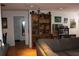 Inviting living room with hardwood floors and a wall-to-wall bookshelf for your personal library at 2697 Vinings Central Dr # 61, Atlanta, GA 30339