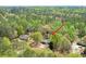 A birds-eye view of the property with two houses nestled in a forest landscape at 798 Tommy Lee Cook Rd, Palmetto, GA 30268