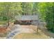 Charming single story home featuring a driveway, attached garage, front porch, and mature trees at 798 Tommy Lee Cook Rd, Palmetto, GA 30268