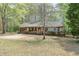 Charming single-story home with a driveway, neutral siding, and a well-maintained front yard at 798 Tommy Lee Cook Rd, Palmetto, GA 30268