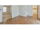 A living area with views into other rooms and multiple entrances at 798 Tommy Lee Cook Rd, Palmetto, GA 30268