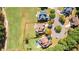 An aerial view highlights the spacious lot, golf course frontage, and convenient access to neighborhood amenities at 8150 Albritton Downs, Cumming, GA 30041