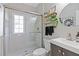 Modern bathroom featuring a glass-enclosed shower, stylish vanity, and contemporary fixtures for a clean and sleek design at 8150 Albritton Downs, Cumming, GA 30041