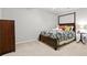 Cozy bedroom featuring a bed, neutral walls, and comfortable decor at 8150 Albritton Downs, Cumming, GA 30041
