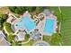 Community pool area with multiple pools and lounge chairs, perfect for relaxation and recreation at 8150 Albritton Downs, Cumming, GA 30041