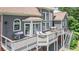 View of the expansive deck, perfect for entertaining, with multiple seating areas at 8150 Albritton Downs, Cumming, GA 30041