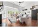 This open concept kitchen features a breakfast bar and direct access to an outdoor deck at 8150 Albritton Downs, Cumming, GA 30041