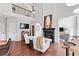 Cozy living room with a fireplace and open floor plan at 8150 Albritton Downs, Cumming, GA 30041
