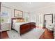 Inviting main bedroom with hardwood floors, neutral tones, and ample natural light at 8150 Albritton Downs, Cumming, GA 30041