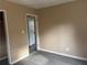 Simple bedroom with wood-look floors and neutral walls at 2764 Plantation Dr, Atlanta, GA 30344