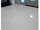 Close-up of kitchen countertop, highlighting its light color and elegant marbled pattern at 3380 Lake Valley Nw Rd, Atlanta, GA 30331
