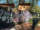 Black fence with graffiti art, adding character to the property at 3380 Lake Valley Nw Rd, Atlanta, GA 30331