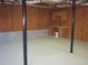 Unfinished basement space, potential for customization and storage with workbench at 434 Spring Leaf Dr, Dallas, GA 30157