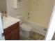 Bathroom with a modern vanity, toilet, and shower with tile flooring at 434 Spring Leaf Dr, Dallas, GA 30157