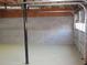 Unfinished garage space with cinder block walls at 434 Spring Leaf Dr, Dallas, GA 30157