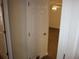 Hallway with hardwood floors, and doors leading to a bright living space at 434 Spring Leaf Dr, Dallas, GA 30157