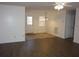Bright living room featuring wood-look flooring and a ceiling fan at 434 Spring Leaf Dr, Dallas, GA 30157