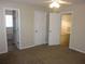 A comfortable main bedroom leads to a bathroom and other rooms at 434 Spring Leaf Dr, Dallas, GA 30157