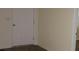 A secondary room view with door and carpet flooring at 434 Spring Leaf Dr, Dallas, GA 30157