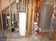 Unfinished basement showing water heater and HVAC system with exposed framing at 434 Spring Leaf Dr, Dallas, GA 30157
