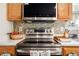 Stainless steel range and microwave in a well-lit kitchen at 159 Misty Ridge Trl, Stockbridge, GA 30281